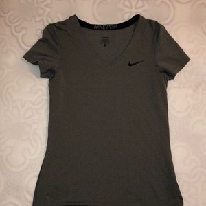 NIKE dry-fit compression shirt. GREY. SIZE M.